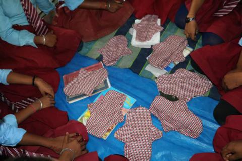Girls learn to make reusable pads in Saptari
